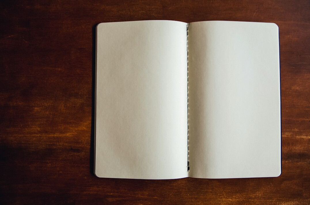 writer notebook in dim light