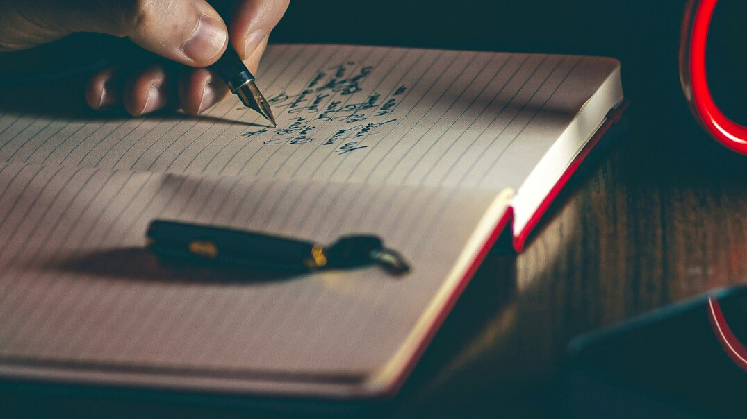 writer working on manuscript