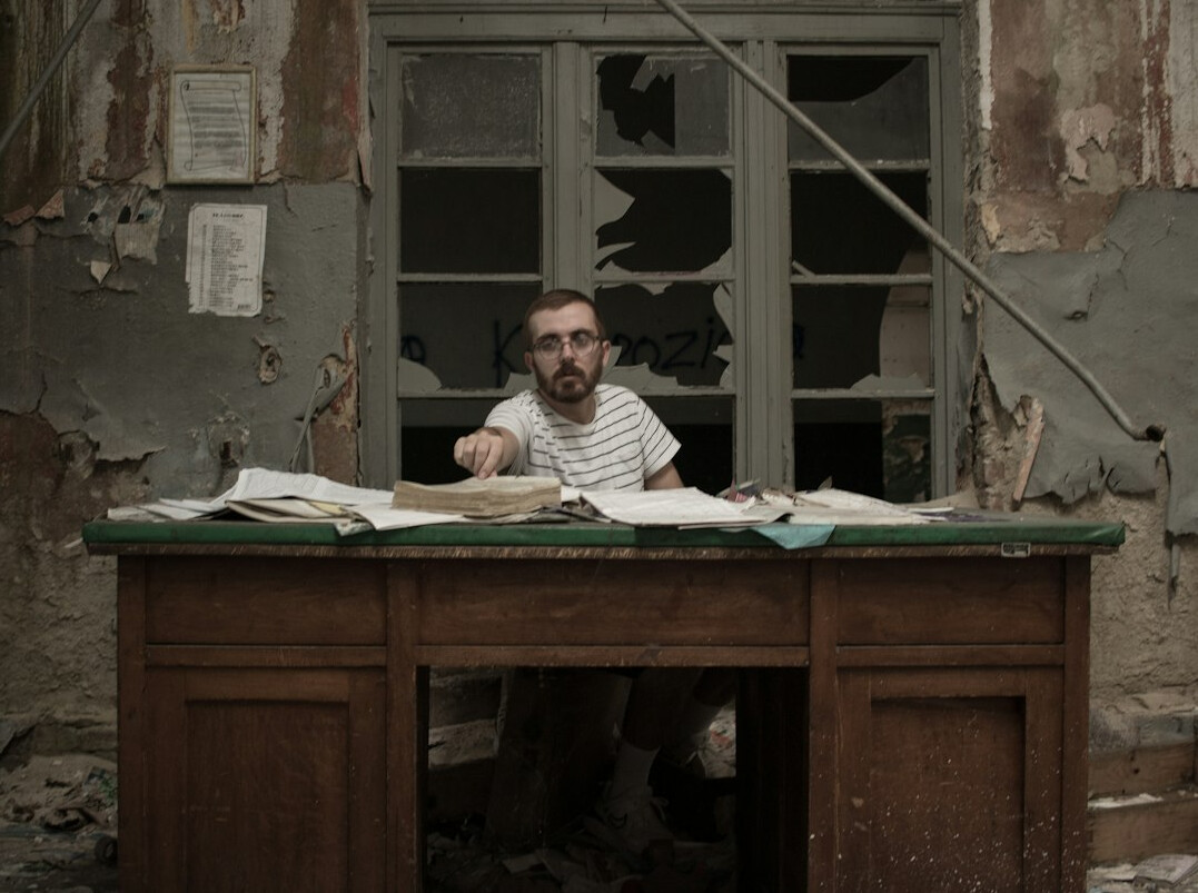 mystery author at desk